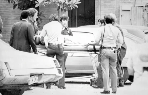 Police attend the scene of Judge John H. Wood Jr's murder